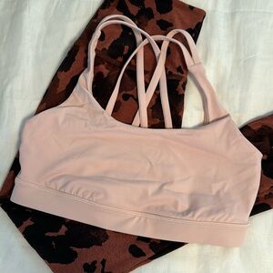 Light pink Lululemon strappy sports bra